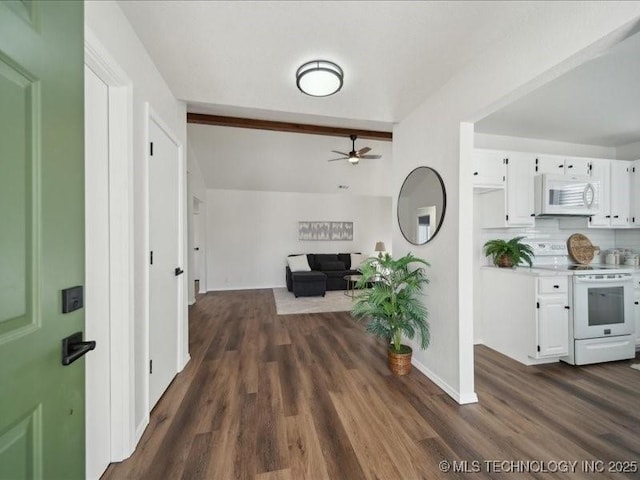 corridor featuring vaulted ceiling with beams, baseboards, and dark wood-type flooring