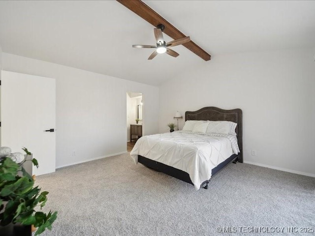 carpeted bedroom featuring a ceiling fan, lofted ceiling with beams, and baseboards