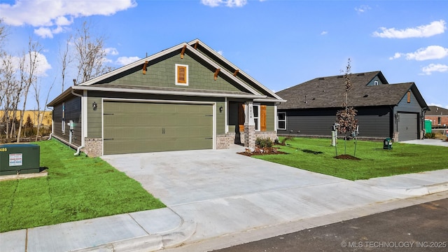 craftsman-style house with a front yard, concrete driveway, and an attached garage