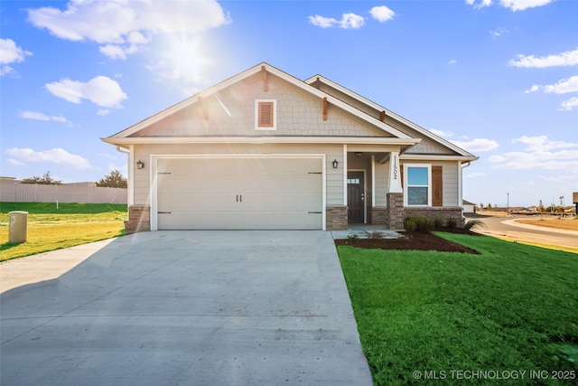 craftsman-style home with a garage, driveway, a front lawn, and fence