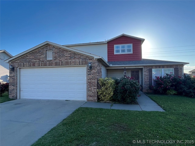 traditional home with a garage, driveway, brick siding, and a front lawn