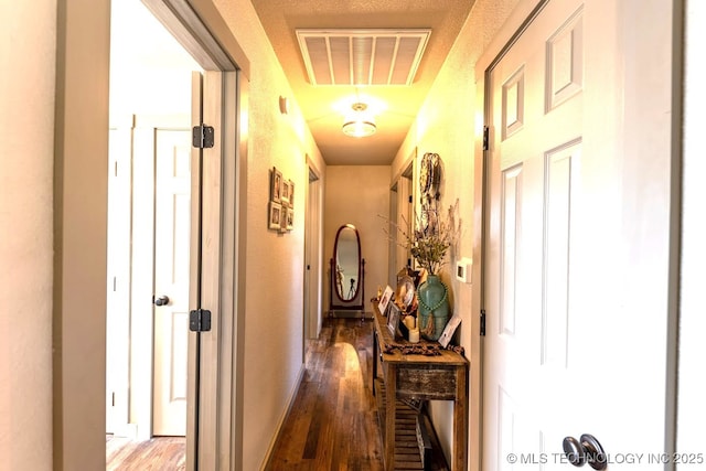 150 Birch Rd, Ardmore, OK 73401 - corridor featuring visible vents and wood finished floors