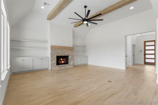 2038 E 129th St, Jenks, OK 74037 - unfurnished living room with ceiling fan, light wood-style floors, a brick fireplace, built in features, and recessed lighting