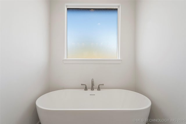 2038 E 129th St, Jenks, OK 74037 - full bathroom with a freestanding tub