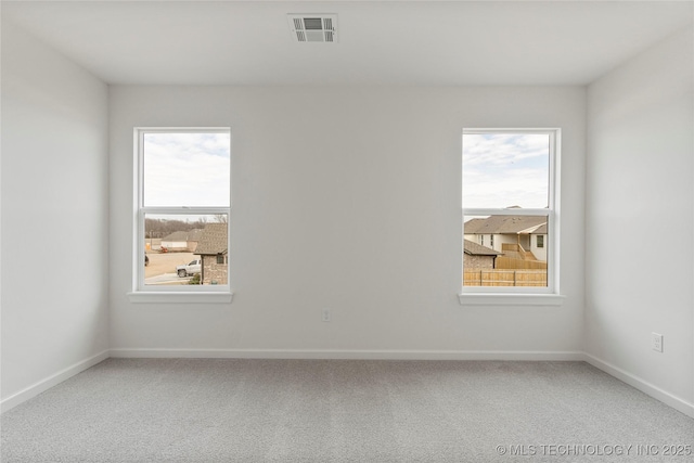 2038 E 129th St, Jenks, OK 74037 - unfurnished room with plenty of natural light and carpet flooring