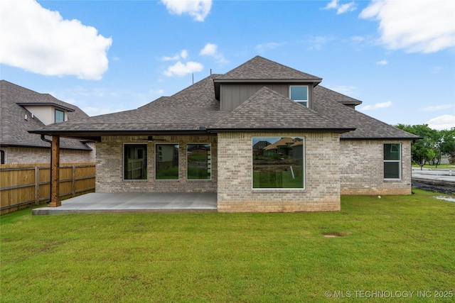 2038 E 129th St, Jenks, OK 74037 - back of house featuring a patio, roof with shingles, and brick siding