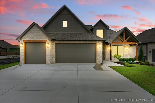 2038 E 129th St, Jenks, OK 74037 - craftsman house with board and batten siding, an attached garage, driveway, and a yard
