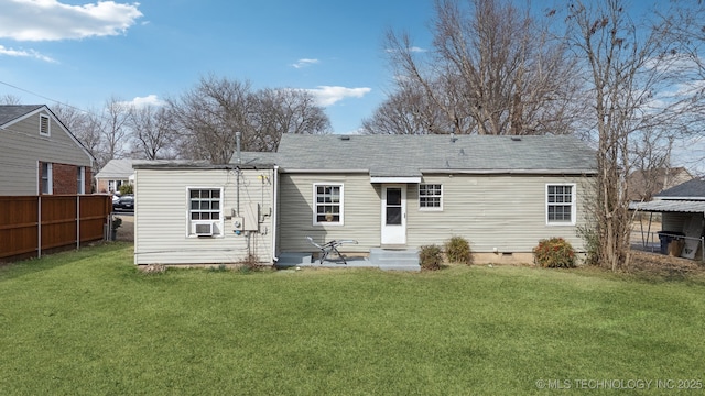 back of house featuring crawl space, fence, cooling unit, and a yard