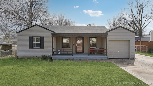 single story home featuring a garage, concrete driveway, a porch, and a front yard