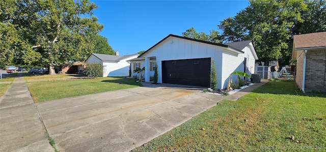 view of property exterior with concrete driveway, brick siding, a lawn, and an attached garage