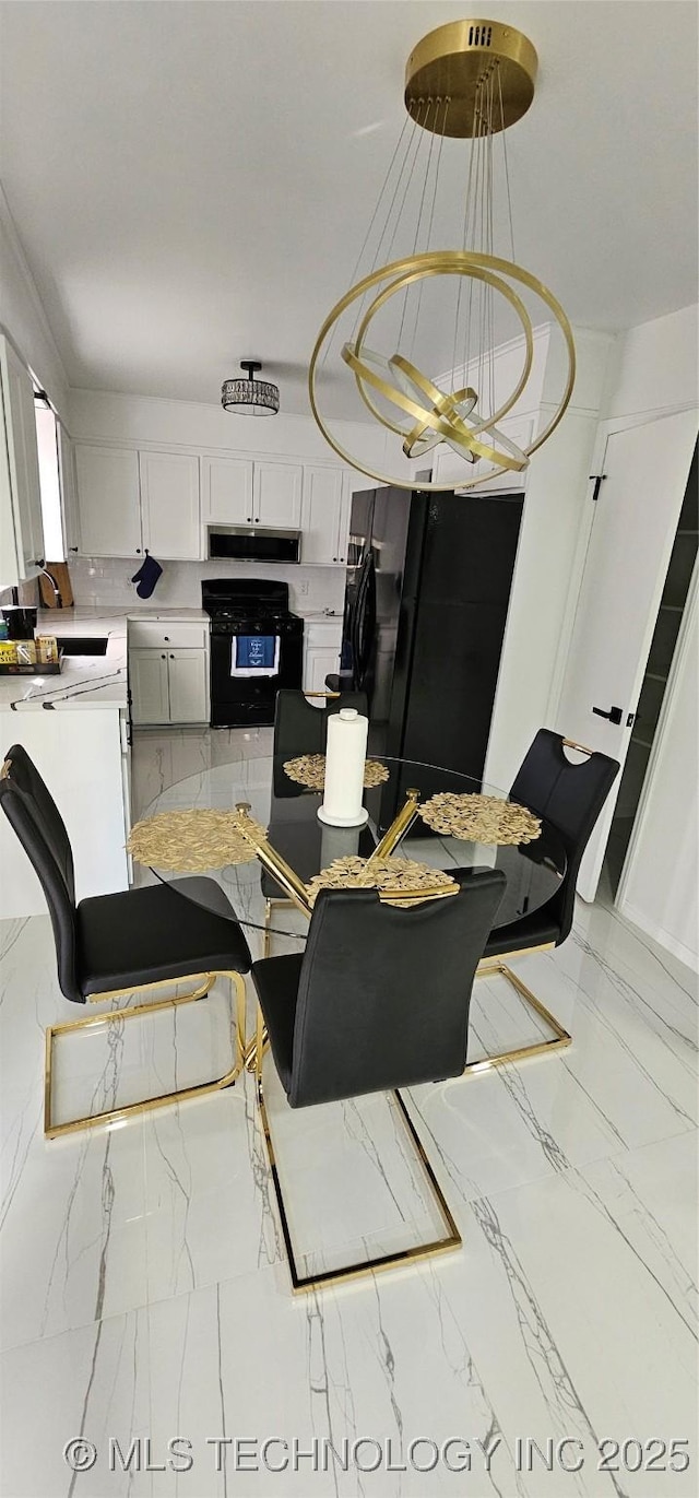 dining room with marble finish floor