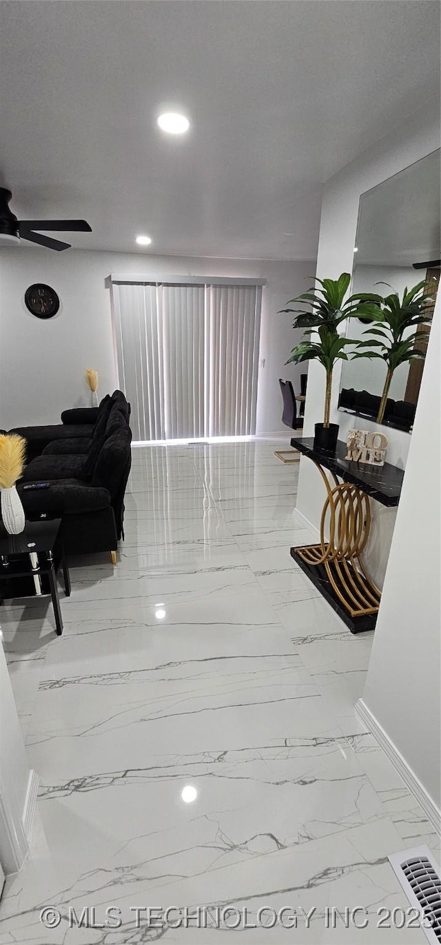 interior space with marble finish floor, visible vents, baseboards, and recessed lighting