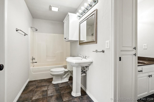 bathroom featuring toilet, visible vents, baseboards, and bathing tub / shower combination