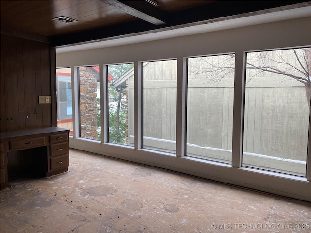 interior space with a wealth of natural light and visible vents