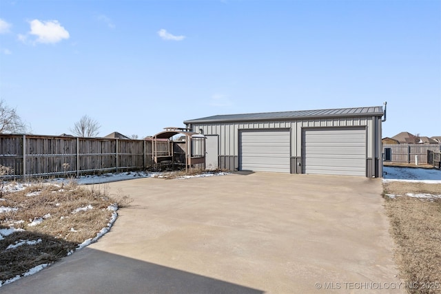 detached garage with fence