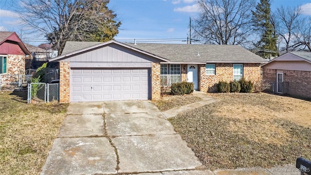 ranch-style home with an attached garage, brick siding, fence, concrete driveway, and a front yard