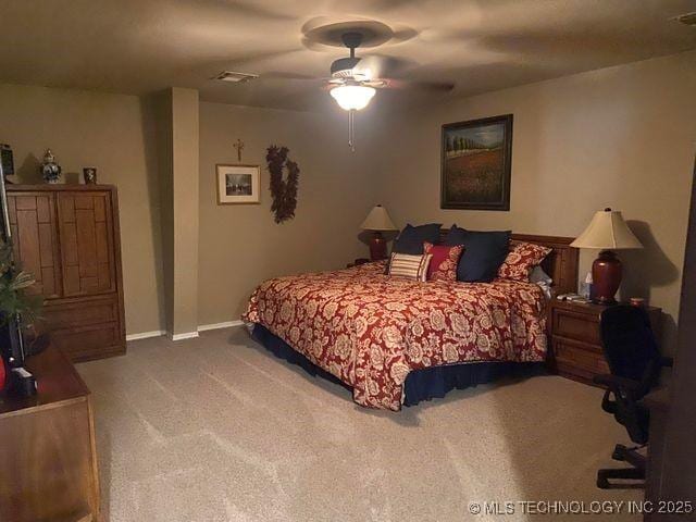 bedroom featuring baseboards, ceiling fan, visible vents, and carpet flooring