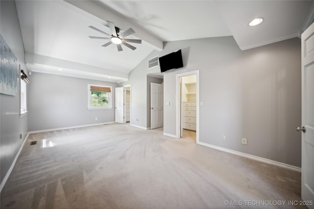 interior space with vaulted ceiling with beams, recessed lighting, light colored carpet, visible vents, and baseboards