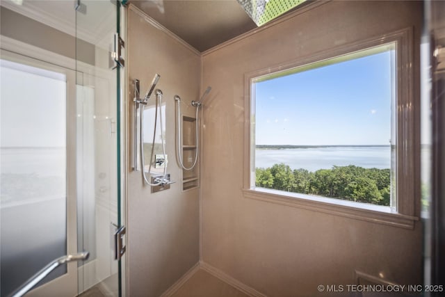 full bath with a water view, crown molding, and walk in shower