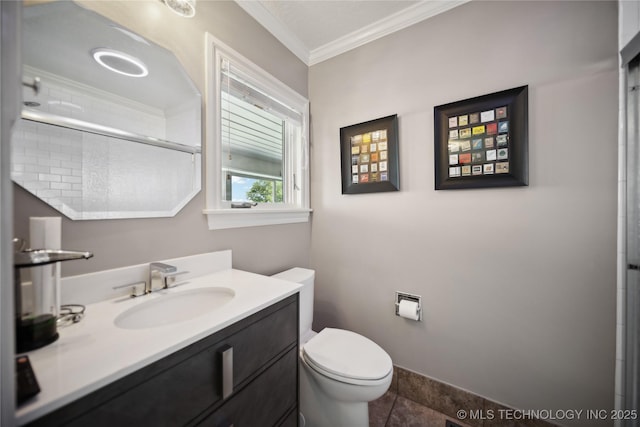 bathroom featuring toilet, ornamental molding, a shower with shower door, vanity, and tile patterned flooring