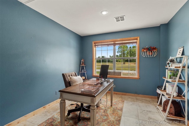 office area with baseboards and visible vents