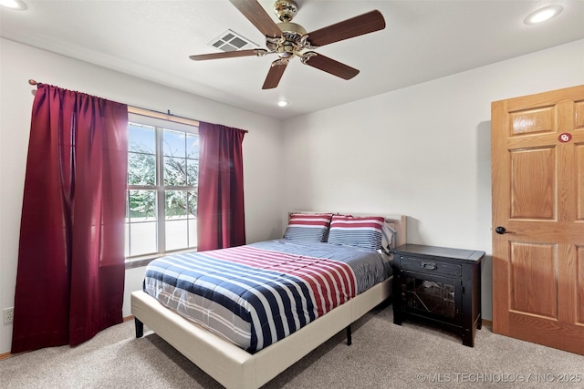 bedroom with recessed lighting, ceiling fan, visible vents, and light colored carpet