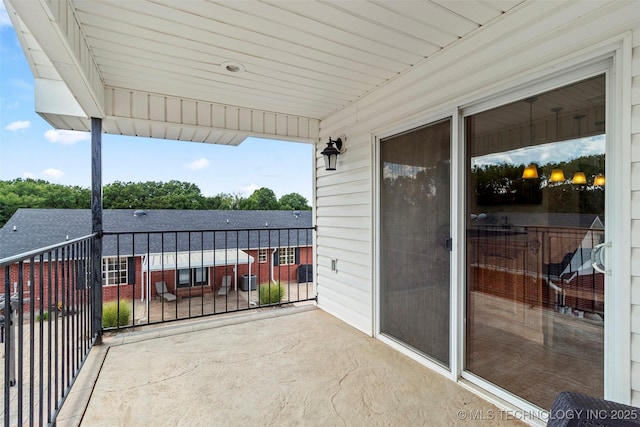 view of patio with a balcony