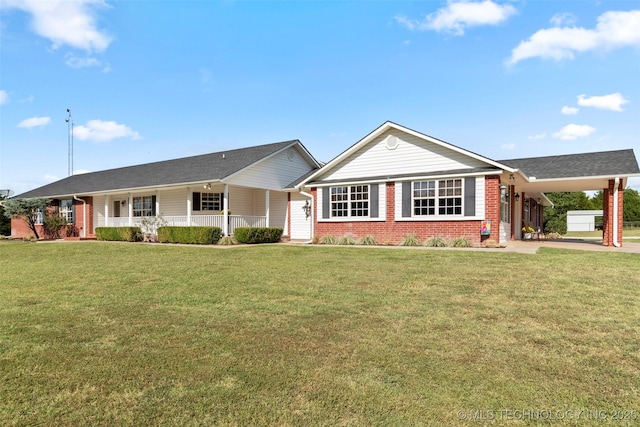 ranch-style house with driveway, a porch, a front lawn, a carport, and brick siding