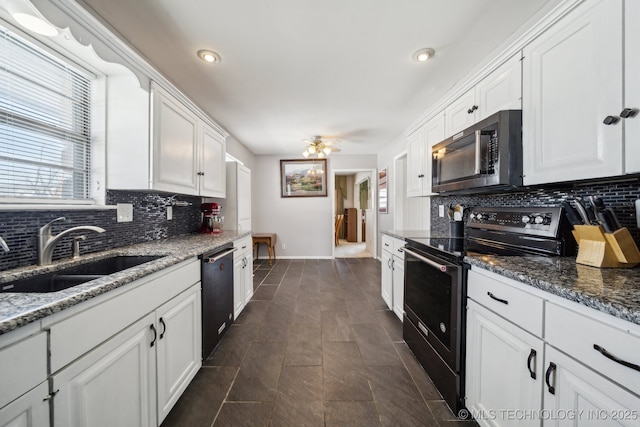 kitchen with black dishwasher, white cabinetry, a sink, and electric range