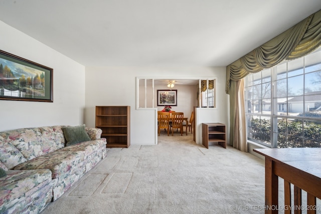 living area with light colored carpet