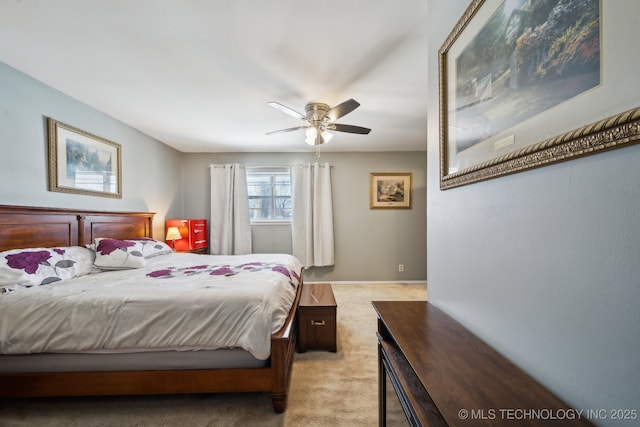 bedroom featuring light carpet and ceiling fan