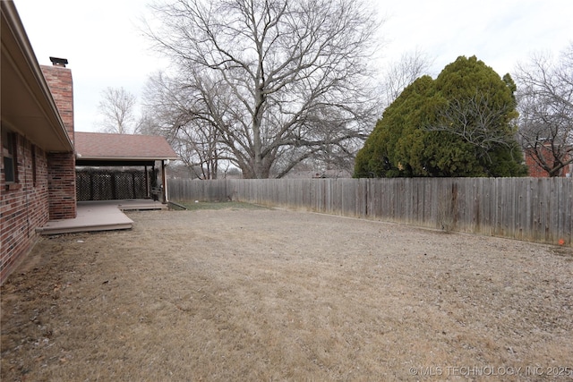 view of yard featuring a fenced backyard and a patio