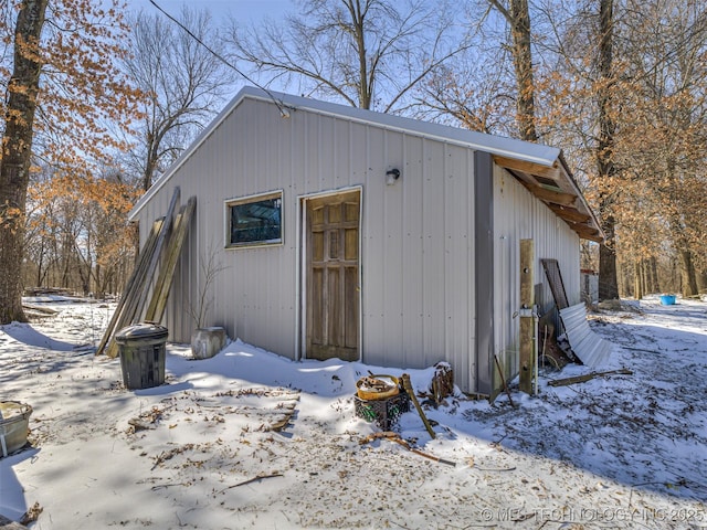 view of snow covered garage