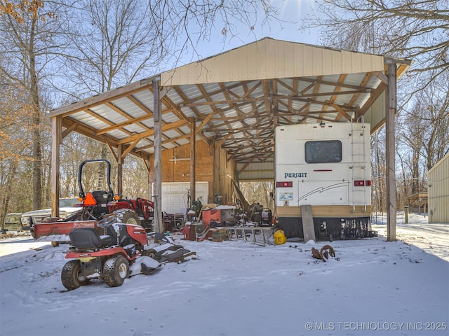 exterior space with a detached carport