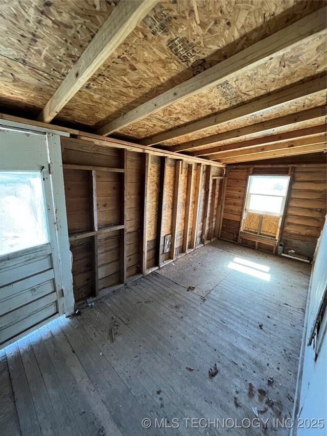 729 W 13th, Ada, OK 74820 - misc room with hardwood / wood-style floors