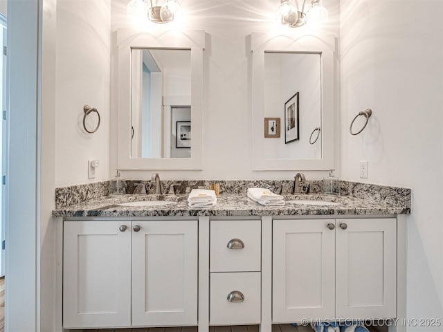 full bath with double vanity and a sink