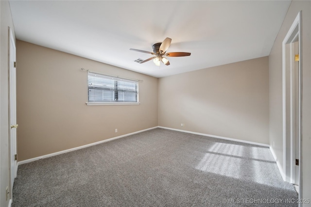 unfurnished room featuring ceiling fan, carpet floors, and baseboards