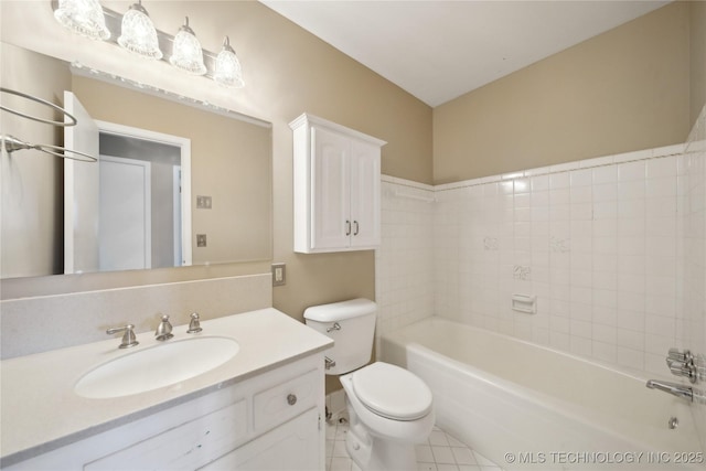 full bathroom featuring tile patterned flooring, vanity, and toilet