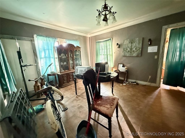 interior space with baseboards and ornamental molding