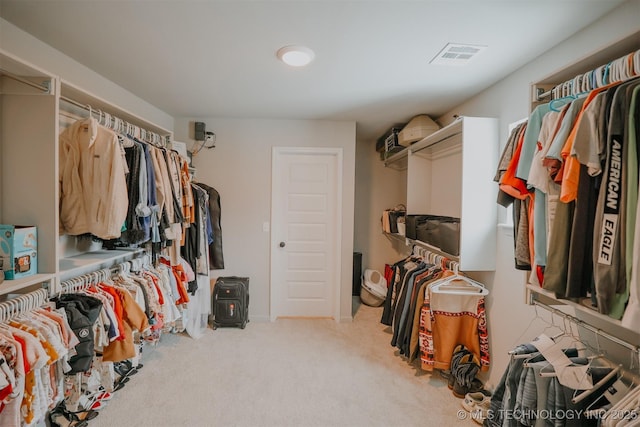 walk in closet with carpet flooring and visible vents