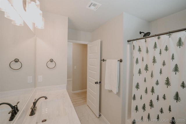 full bathroom with a shower with shower curtain, vanity, visible vents, baseboards, and marble finish floor