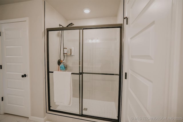 bathroom featuring a stall shower