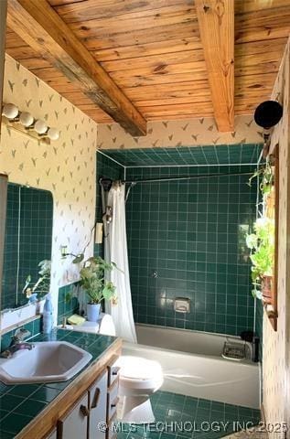 full bath with shower / bath combination with curtain, beam ceiling, vanity, and wallpapered walls