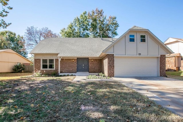 view of front of home with an attached garage, a shingled roof, concrete driveway, and brick siding