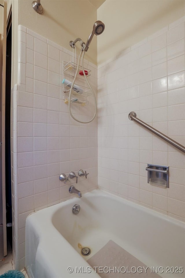 bathroom with shower / bath combination