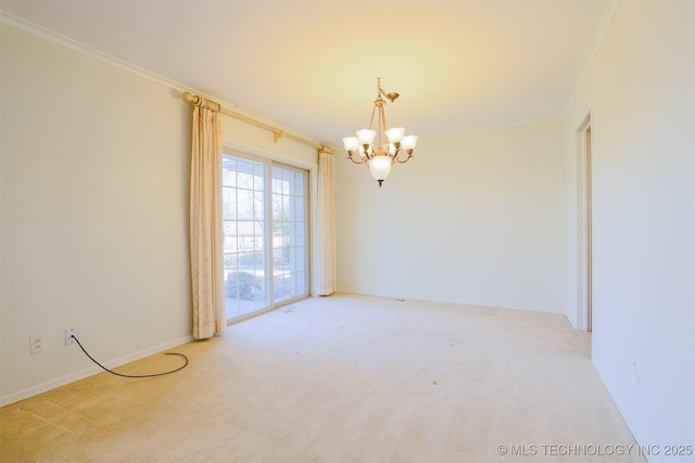 empty room featuring an inviting chandelier, carpet floors, crown molding, and baseboards