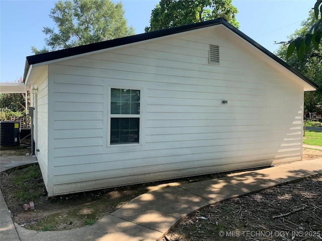 view of property exterior with central AC unit