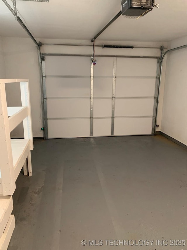 garage featuring a garage door opener