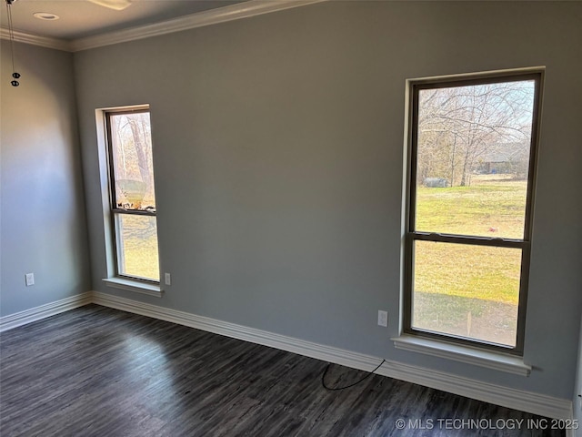 unfurnished room with baseboards, dark wood-type flooring, and ornamental molding