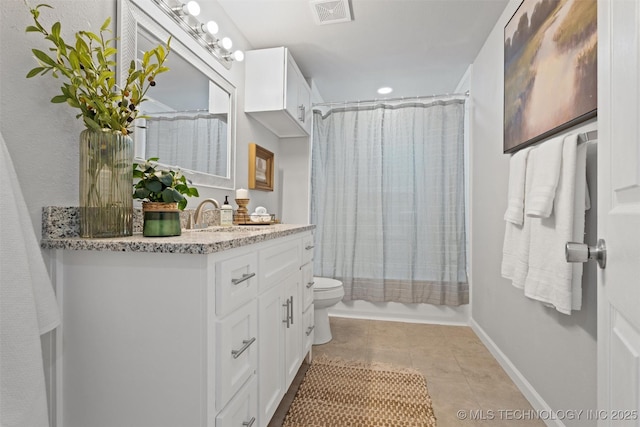 bathroom featuring toilet, shower / tub combo, vanity, visible vents, and tile patterned floors